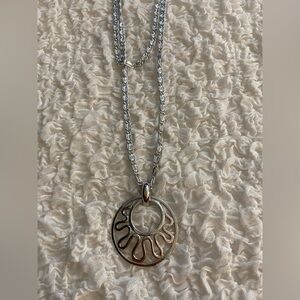 Vintage Sarah Coventry stamped silver long necklace with circular pendant